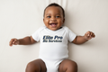 African American happy baby with onesie on that says Elite Pro Biz Services on it 